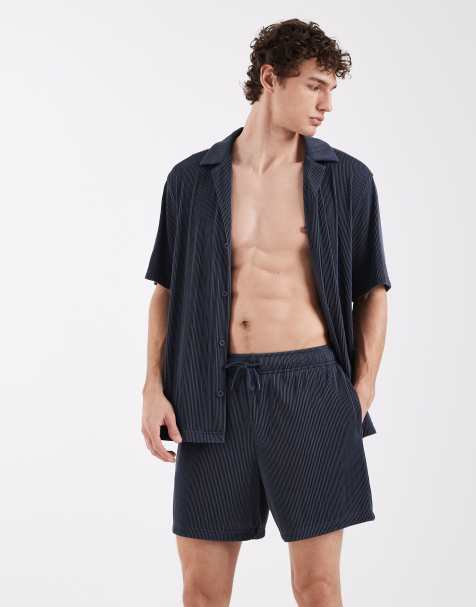 ASOS DESIGN plisse mid-length swim shorts in blue (Part of a set) - view 1