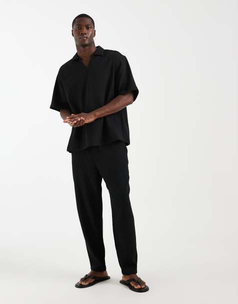 ASOS DESIGN plisse pants in tapered fit in black - part of a set - view 1