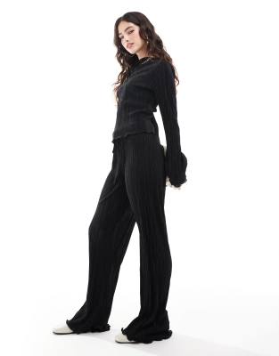 plisse pants with fluted hem in black - part of a set