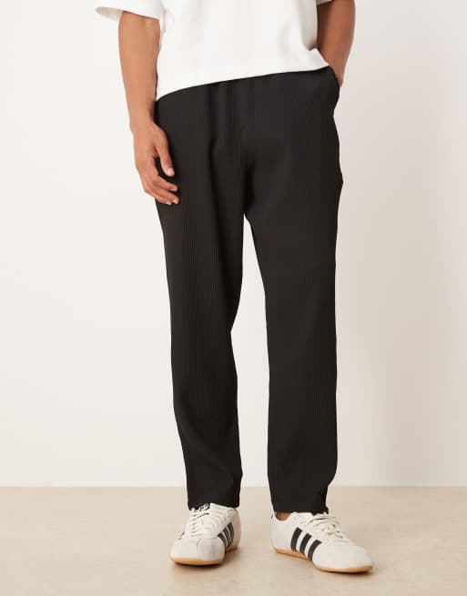 ASOS DESIGN plisse tapered pants in black