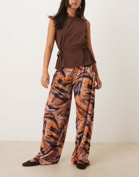 ASOS DESIGN plisse wide leg trousers in orange marble print - view 1