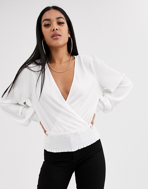 ASOS DESIGN plisse wrap top with shirred cuff and waist in ivory