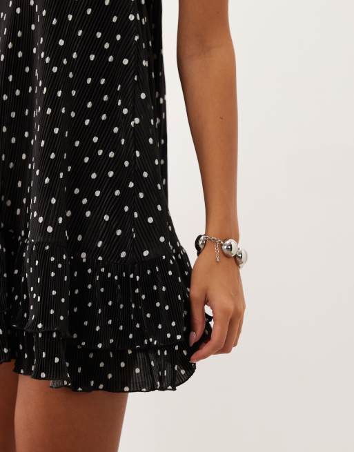 ASOS DESIGN Plissee-Halterneck-Minikleid mit Volantsaum und Punktmuster, 3 von 4