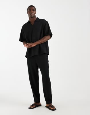 Plissierte, schmal zulaufende Hose in Schwarz, Kombiteil Schwarz L