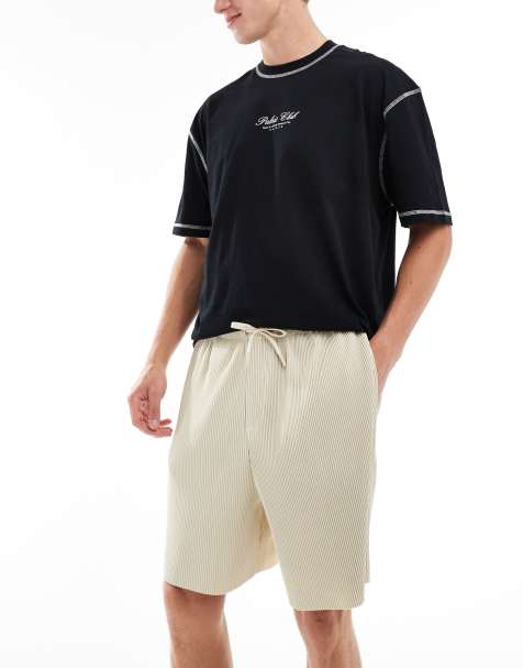 ASOS DESIGN – Plissierte, strukturierte Oversize-Shorts in Beige - view 1