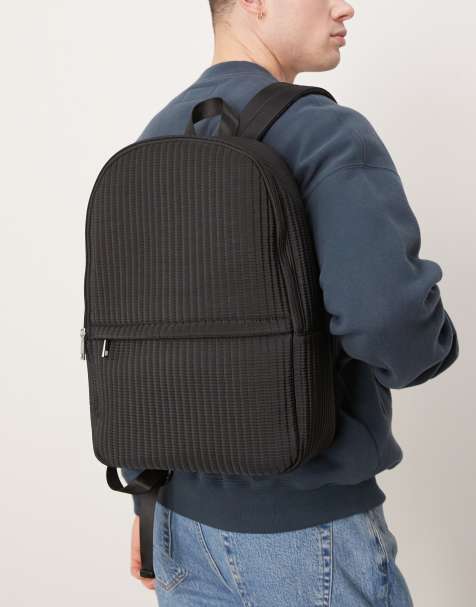 ASOS DESIGN – Plissierter, gesteppter Nylon-Rucksack in Schwarz - view 1