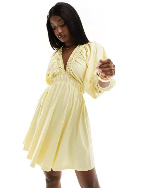 ASOS DESIGN plunge elastic tea mini dress with ruched waist in lemon - view 1