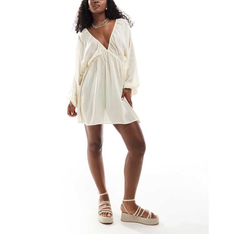 ASOS DESIGN plunge long sleeve sheer mini beach dress with