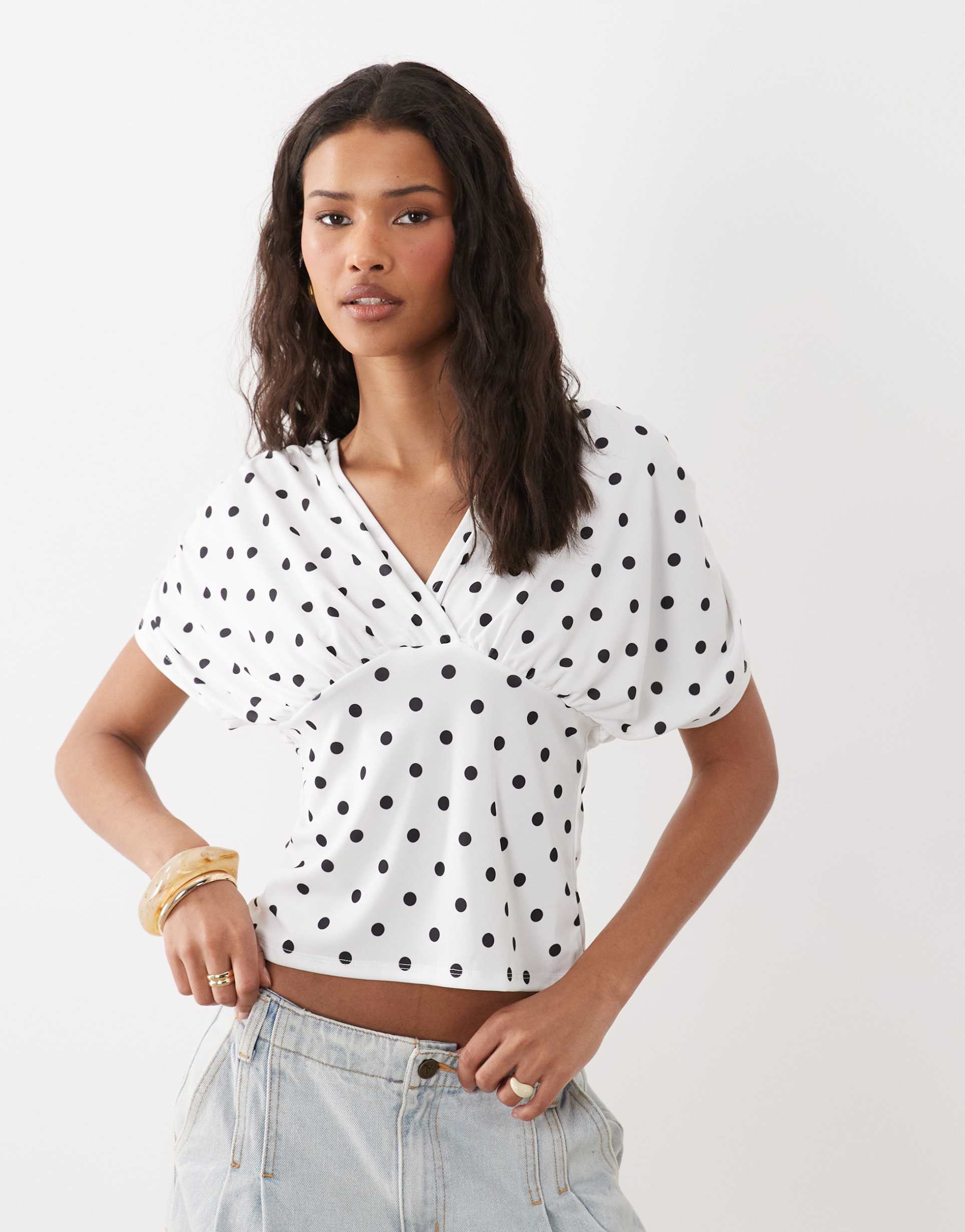 asos design plunge with cinched waist top in stone polka dot
