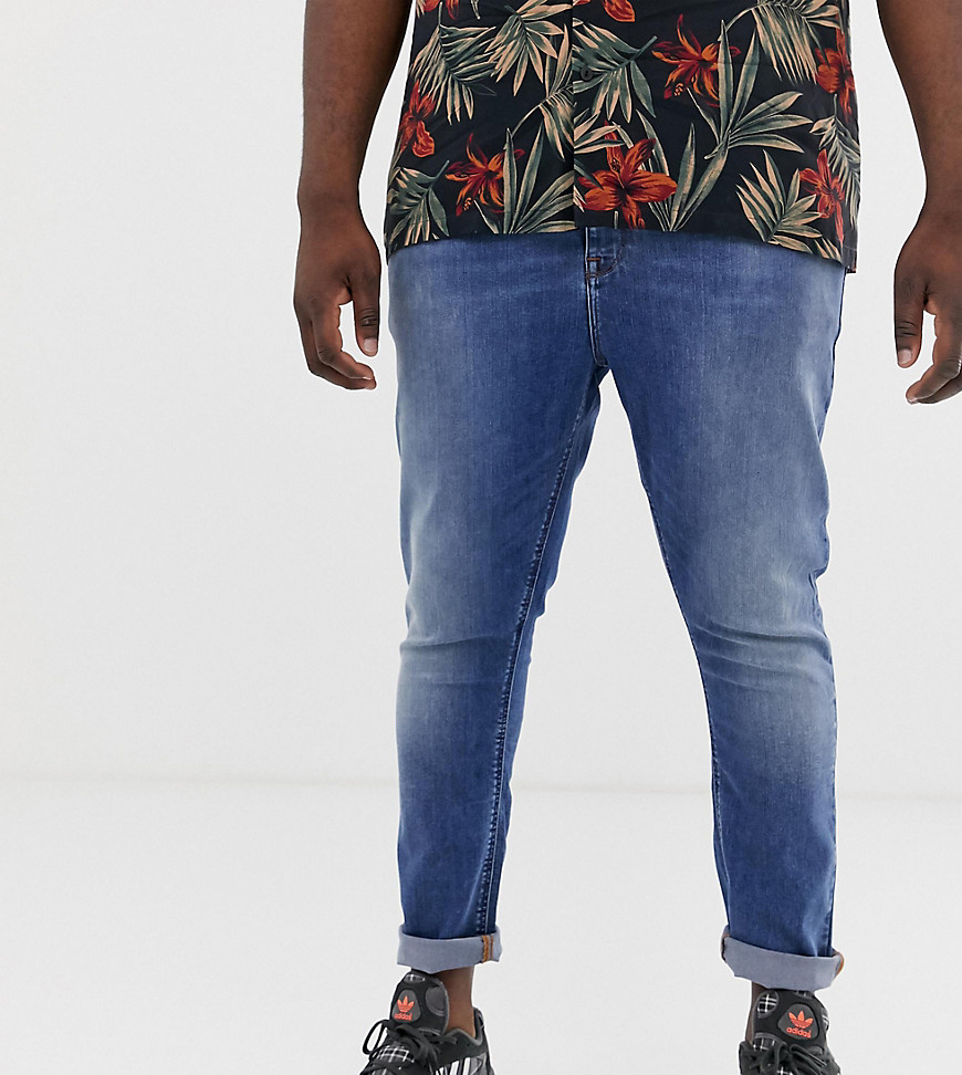 ASOS DESIGN Plus - Bespoten jeans van stevig stretchdenim in mid-wash blauw
