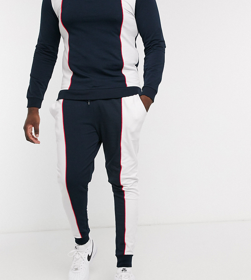 ASOS DESIGN Plus - Combi-set superskinny joggingbroek met retro sportieve kleurvlakken en biezen-Marineblauw