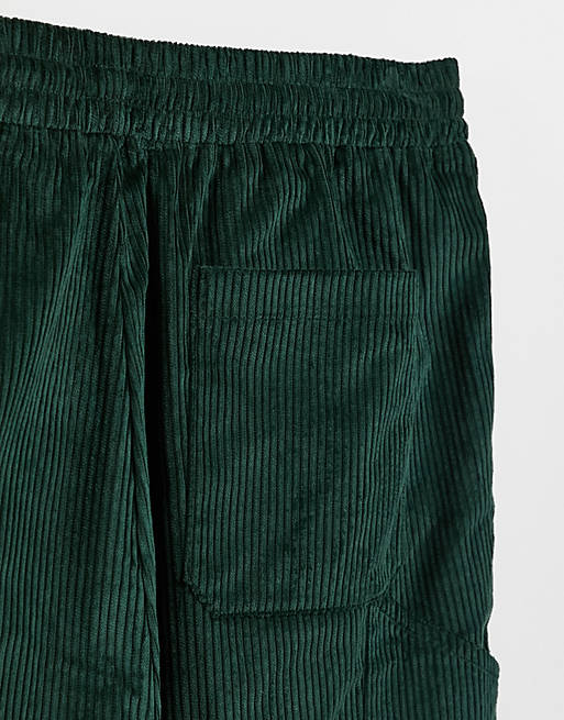ASOS DESIGN Plus corduroy relaxed fit skate pants in forest green