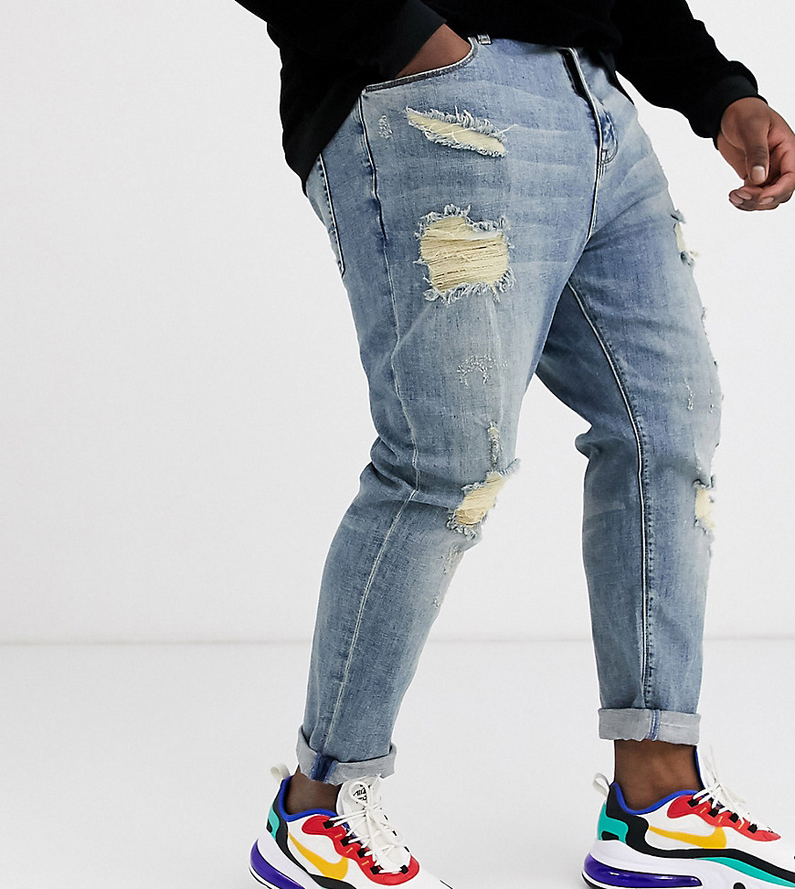 ASOS DESIGN Plus – Ljusblå, avsmalnande jeans med stora revor