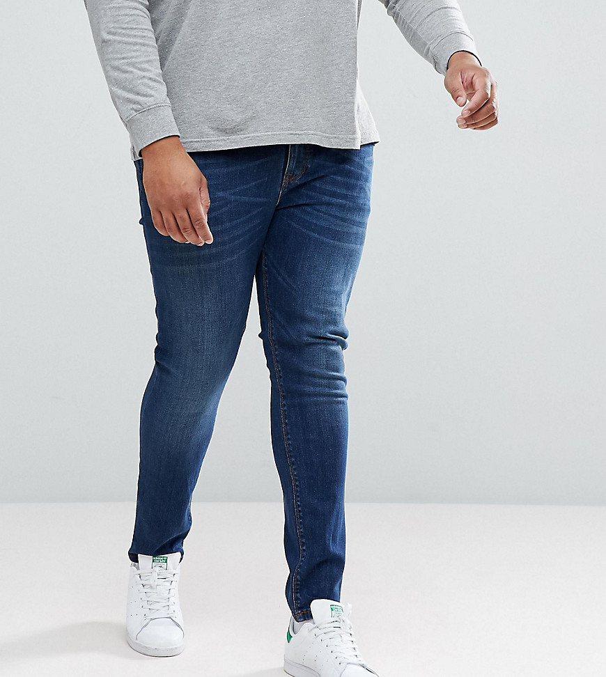 ASOS DESIGN – Plus – Mörktvättade superskinny jeans-Blå