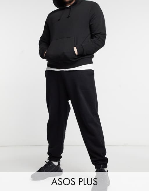 ASOS DESIGN Plus oversized sweatpants with narrow waistband and cuffs in black | ASOS