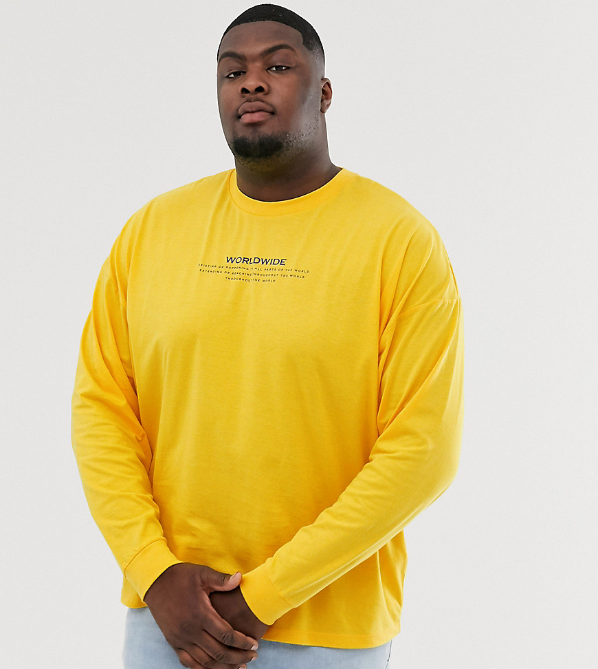 ASOS DESIGN - Plus - Oversized T-shirt van organisch katoen met lange mouwen en print op de borst-Geel