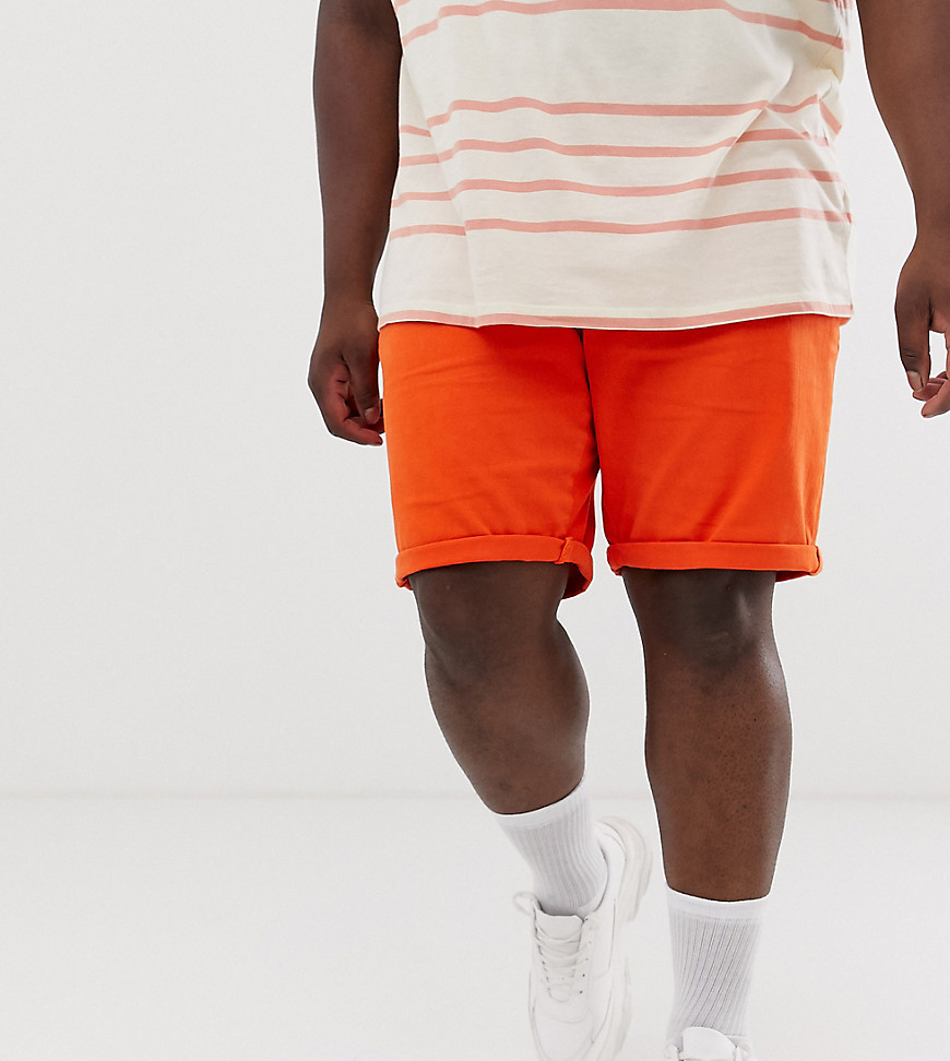 ASOS DESIGN Plus - Pantaloncini di jeans slim arancioni-Arancione