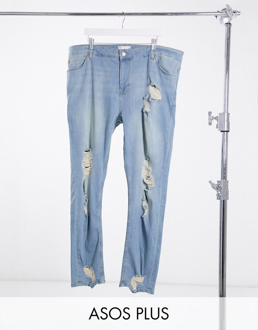 ASOS DESIGN Plus skinny jeans in light blue green cast wash with heavy rips