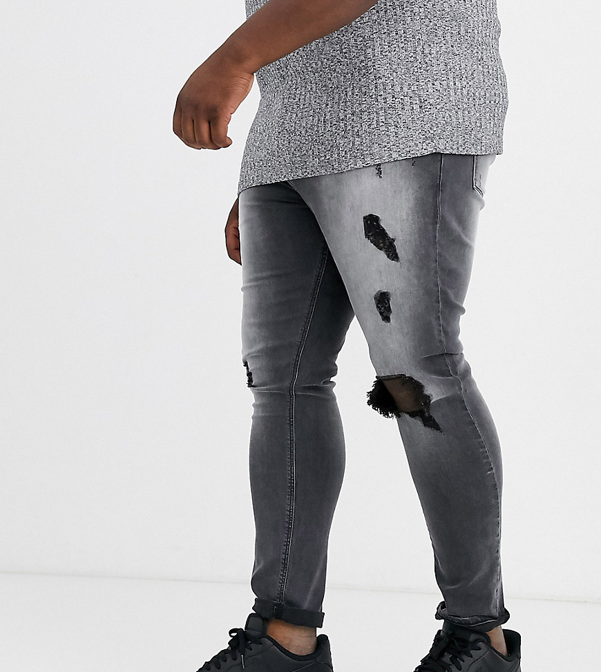 ASOS DESIGN Plus — Sorte spray on jeans i powerstræk med store flænser