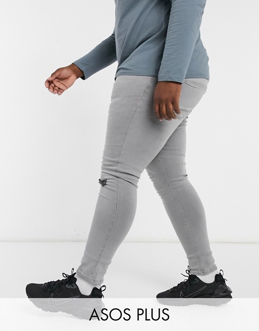 ASOS DESIGN Plus spray on jeans with power stretch in pale grey with knee rip and abrasions