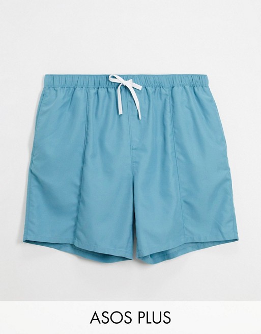 ASOS DESIGN Plus swim shorts with pintuck in blue mid length
