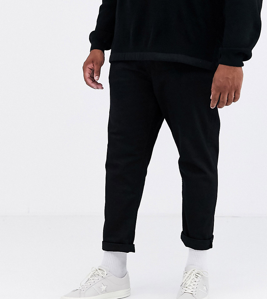 ASOS DESIGN Plus tapered carrot fit jeans in black