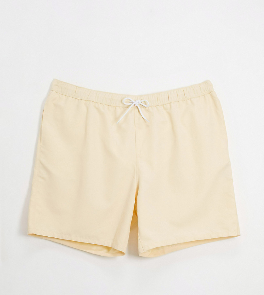 ASOS DESIGN Plus yellow swim shorts mid length