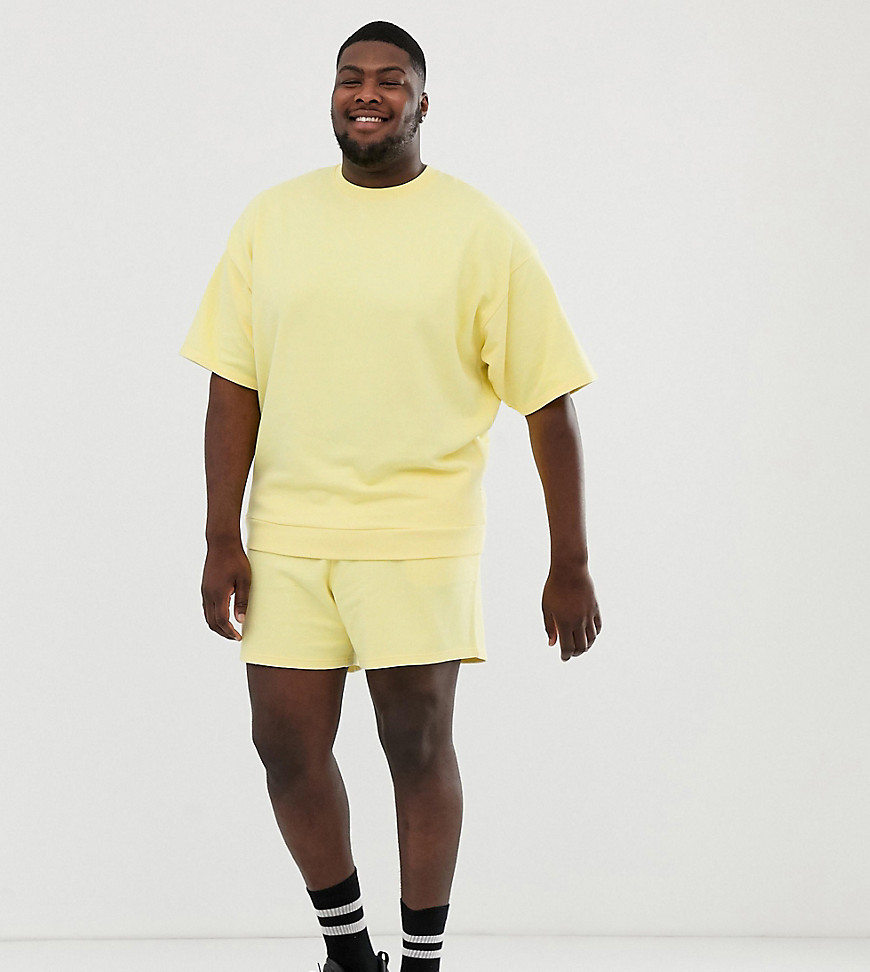 ASOS DESIGN – Plusstorlek – Ljusgul träningsoverall med kortärmad oversize-sweatshirt och shorts