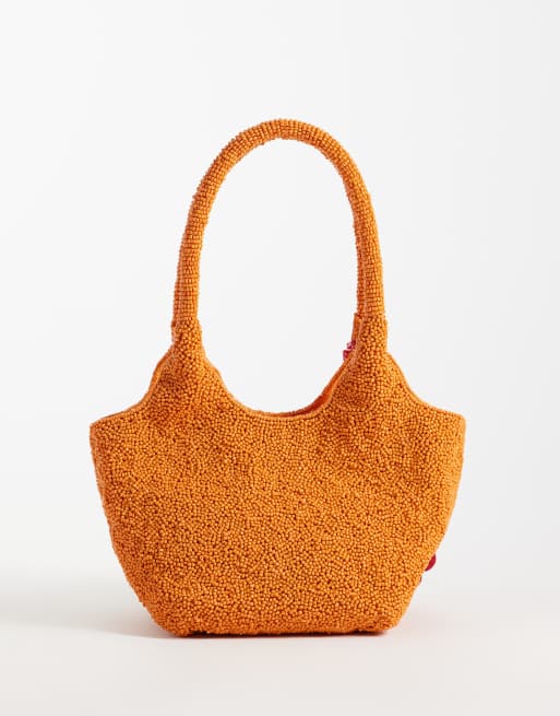 ASOS DESIGN - Pochette a secchiello arancione con decorazioni floreali, 4 di 4