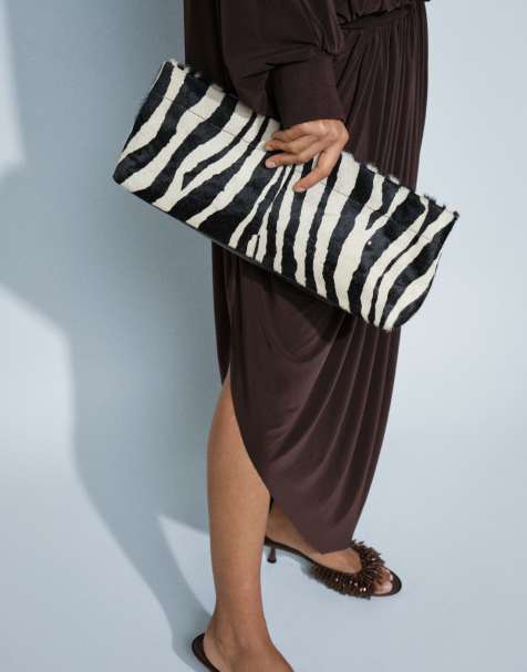 ASOS DESIGN pochette allongée à poignée en cuir effet poil imprimé zébré - view 1