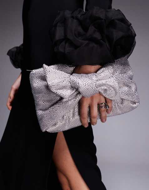 ASOS DESIGN - Pochette ornée de strass à gros nœud à l'avant - Rose - view 1