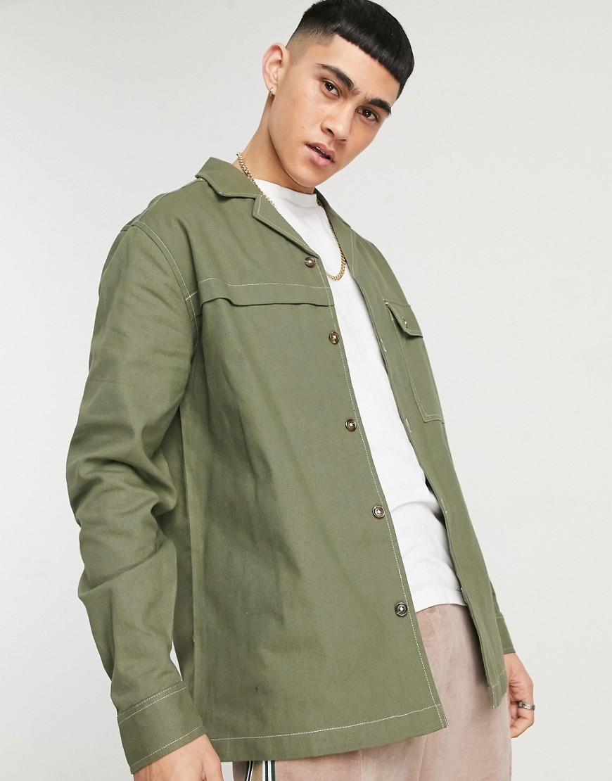 ASOS DESIGN pocket detail overshirt in khaki with hand back placement print-Green