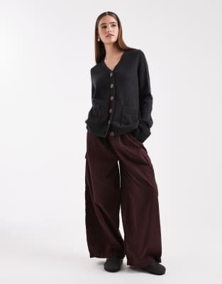 Asos Design Pocketed Front Boyfriend Cardigan In Black