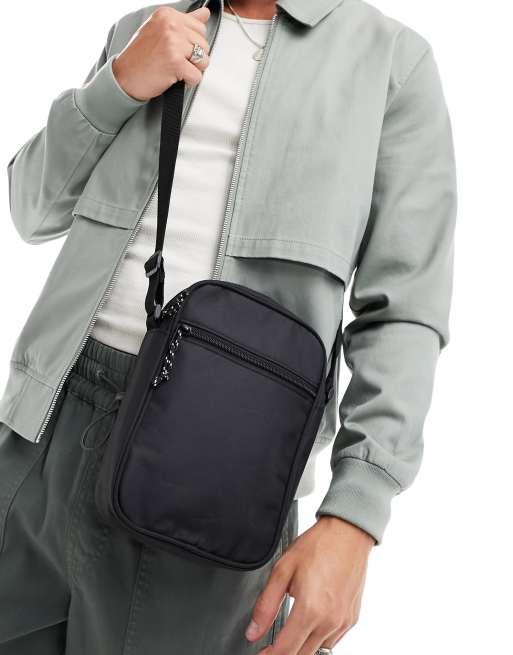 ASOS DESIGN – Podręczna czarna torba crossbody z kontrastowymi zawieszkami przy suwakach