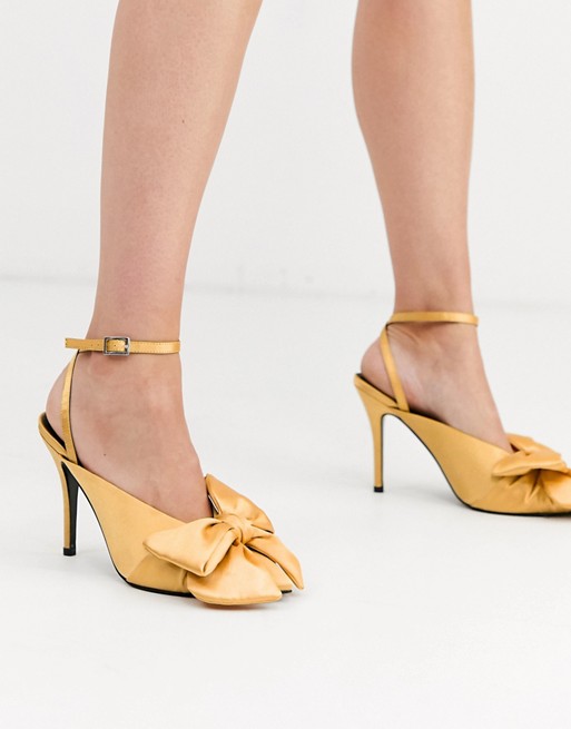 ASOS DESIGN Poetry pointed high heel mules with bow in yellow satin