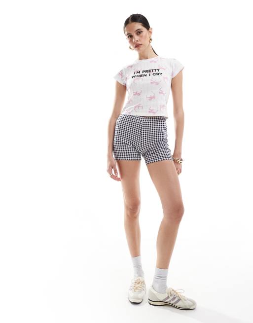 ASOS DESIGN pointelle baby tee with pretty slogan graphic in all over bow print, 3 of 4