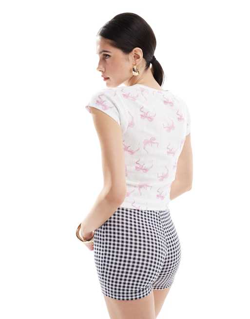 ASOS DESIGN pointelle baby tee with pretty slogan graphic in all over bow print, 4 of 4