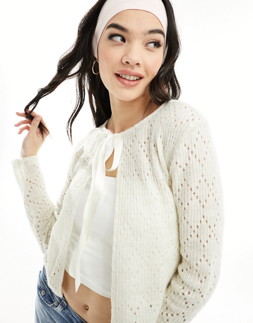 ASOS DESIGN pointelle knit slim fit cardigan with bow ribbon in ecru-White
