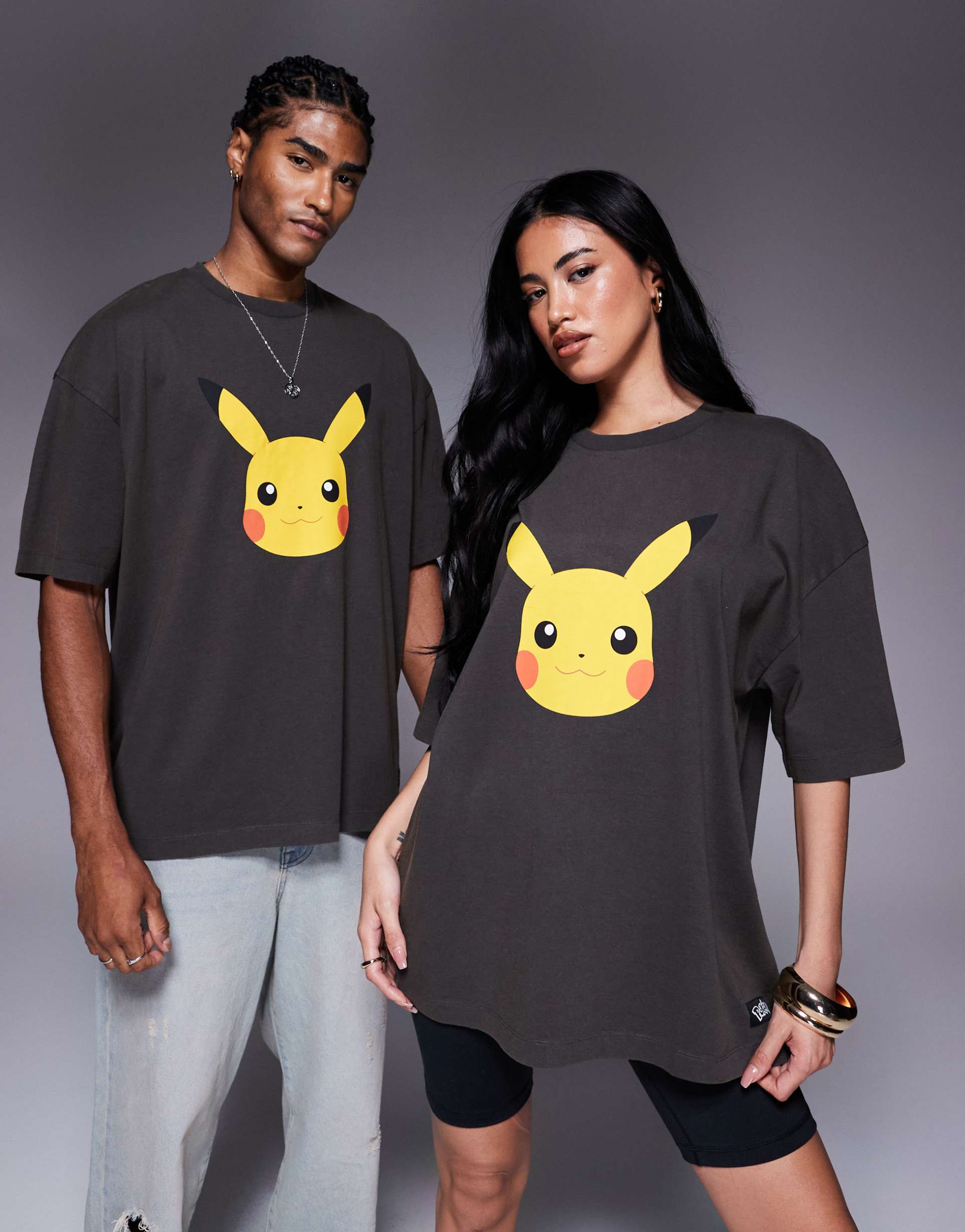 asos design pokemon unisex oversized t-shirt with pikachu prints in washed black