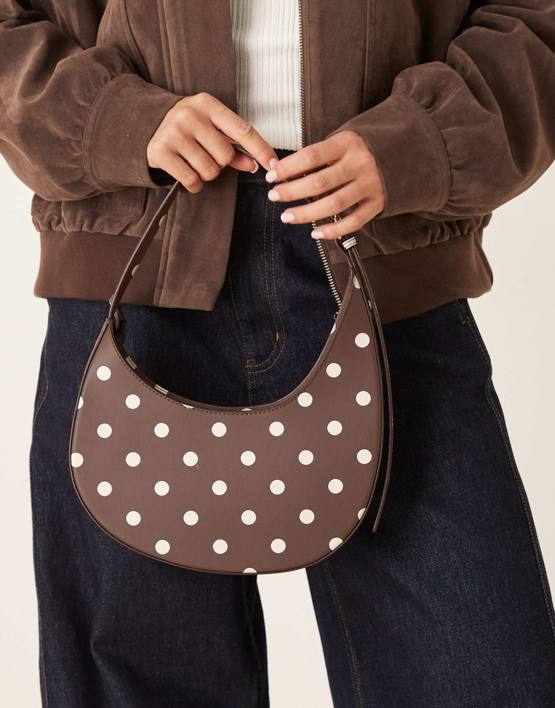 asos design polka dot asymmetric scoop shoulder bag with buckle detail in chocolate