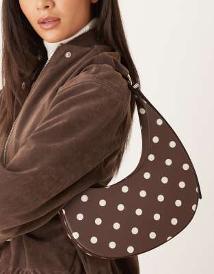 Asos Design Polka Dot Asymmetric Scoop Shoulder Bag With Buckle Detail In Brown