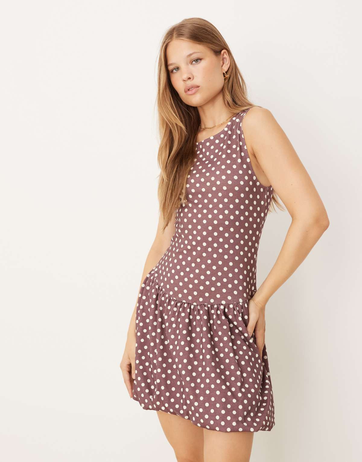 ASOS DESIGN polka dot bubble hem mini dress in brown spot print