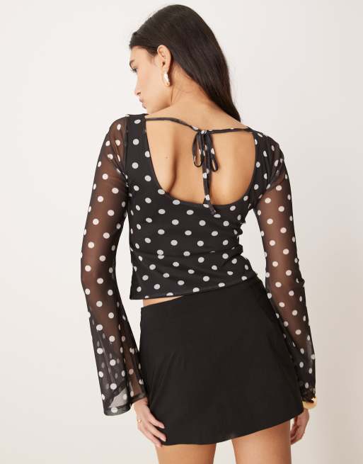 ASOS DESIGN polka dot printed mesh angel sleeve top with open tie back in black