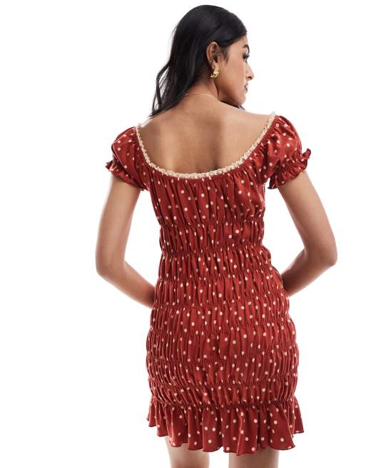 ASOS DESIGN polka dot shirred mini tea dress with tie front in red
