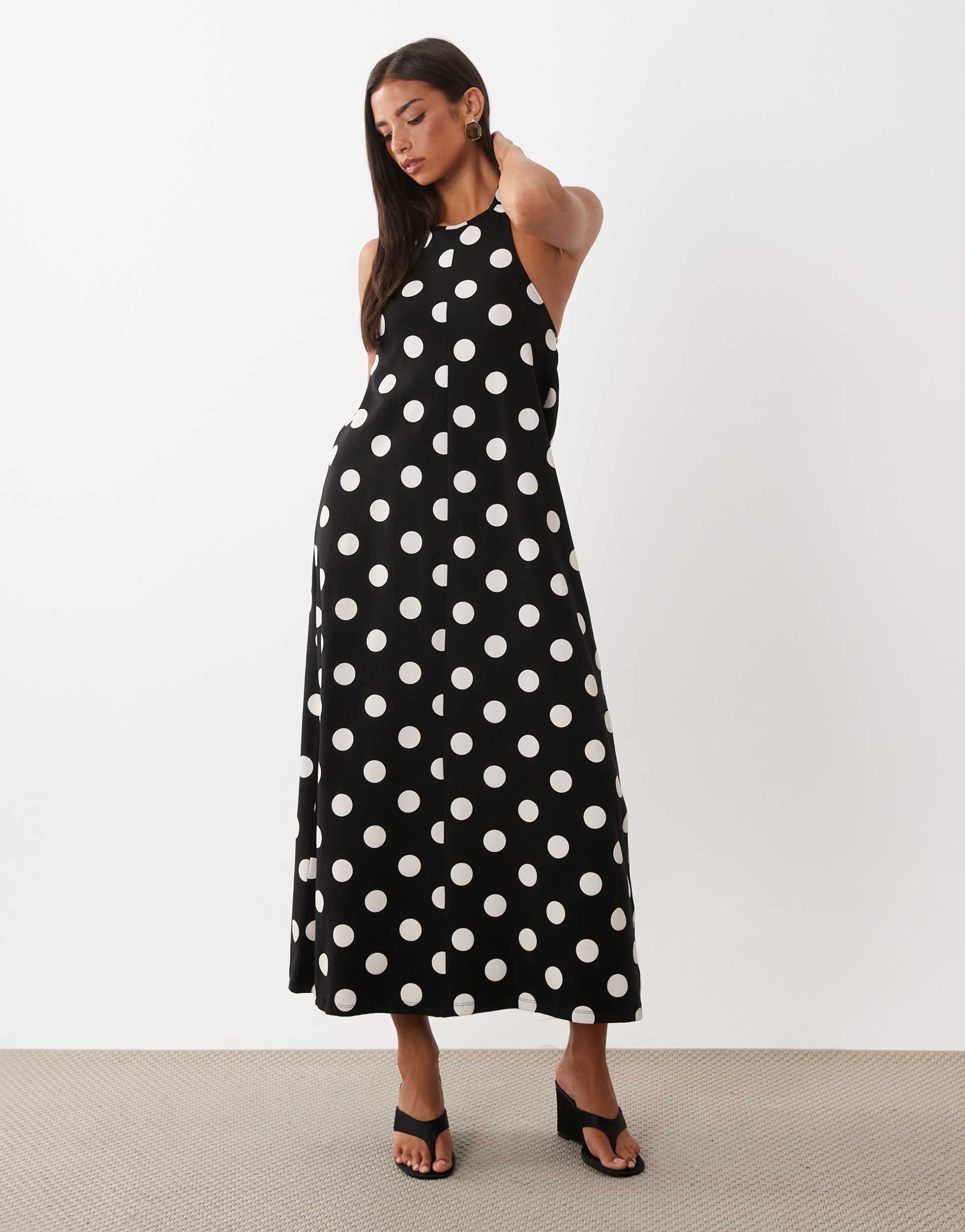 asos design polka dot trapeze midi dress in black and white