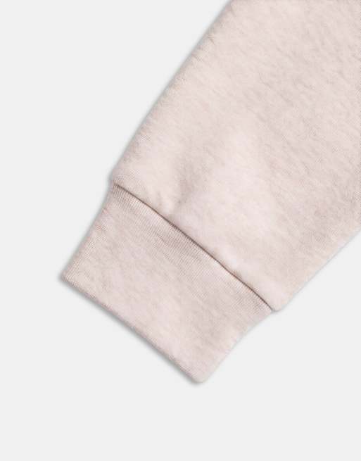 ASOS DESIGN polo à manches longues coupe décontractée à quart de zip en tissu style scuba crème, 9 de 9