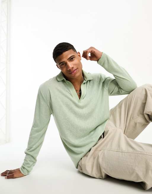 ASOS DESIGN - Polo comoda a maniche lunghe kaki testurizzata con scollo a V profondo e rever