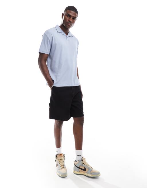 ASOS DESIGN - Polo comoda grigia a coste con rever