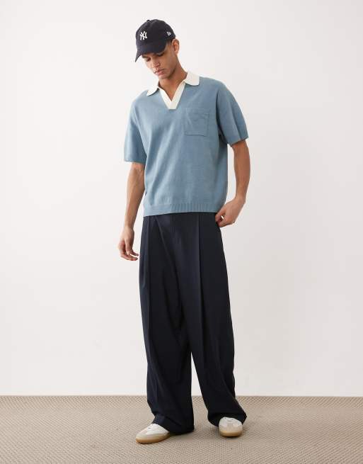 ASOS DESIGN - Polo comoda in maglia blu con intaglio sul collo e tasca sul davanti