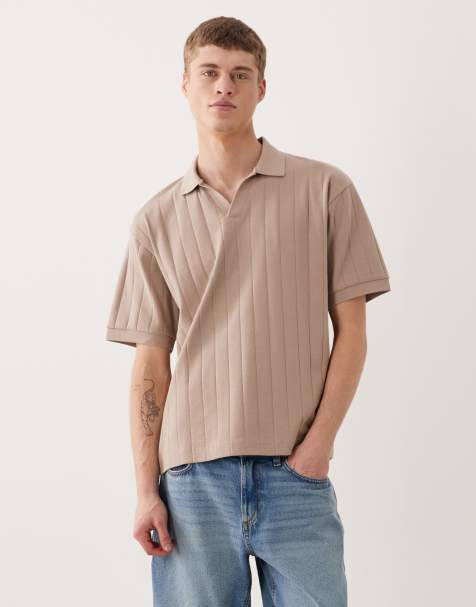 ASOS DESIGN - Polo con collo a rever taglio comodo marrone a coste larghe - view 1